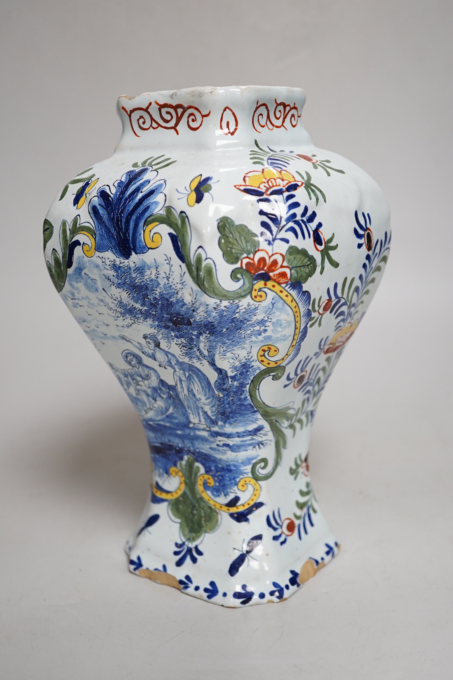 An 18th century Delft polychrome vase, 24cm high